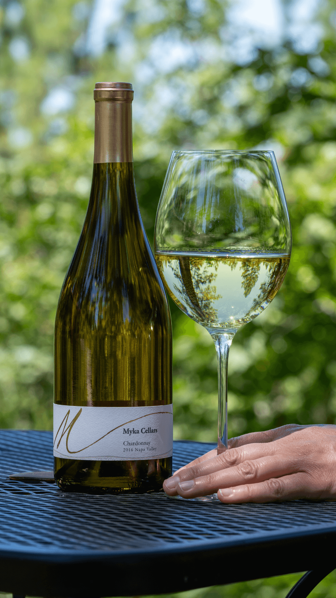 bottle of chardonnay and a glass