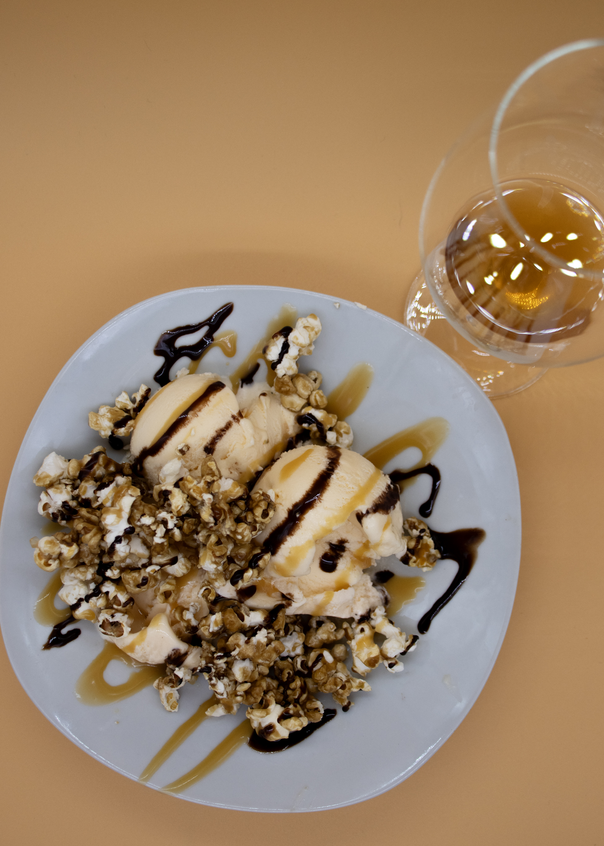 Caramel Corn Sundae with glass of sherry style dessert wine