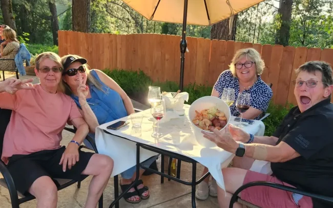 A group of friends enjoying an outdoor tasting at Myka