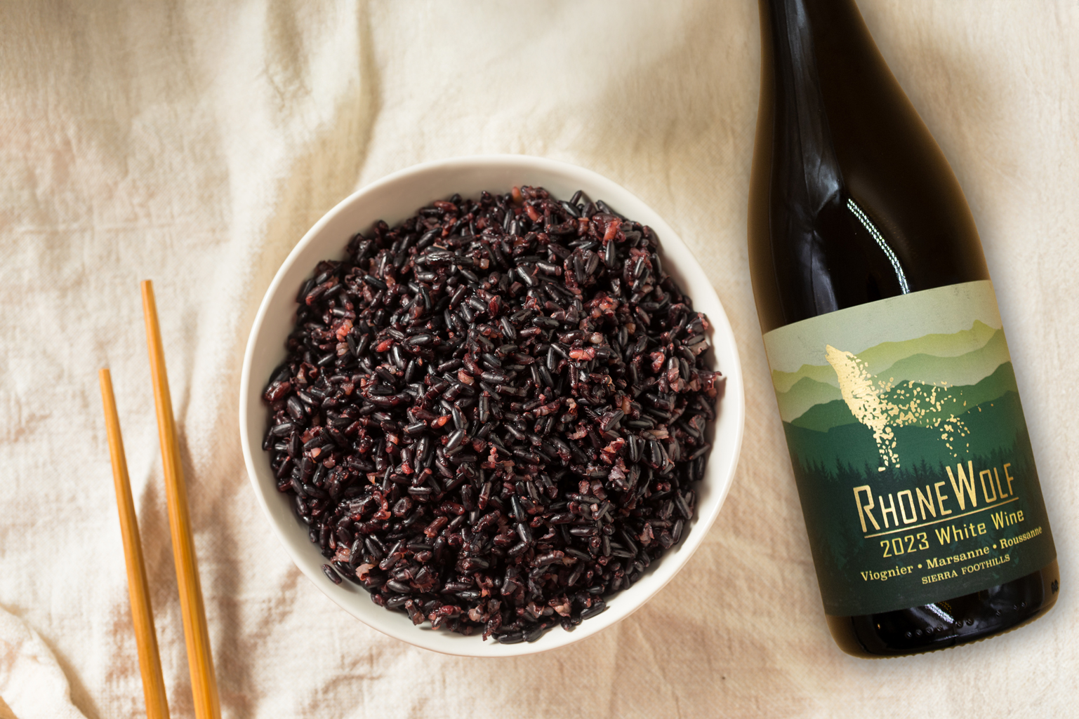 ForbiddenRiceWithRhoneWolf Coconut Curry forbidden rice and bottle of RhoneWolf white wine